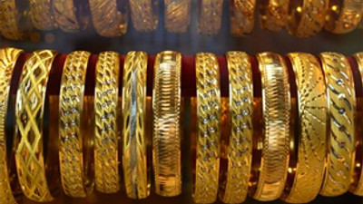 Altın üç haftanın zirvesine yakın